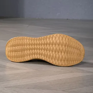 Detailed macro view of the anti-slip honeycomb rubber outsole for men's running shoes