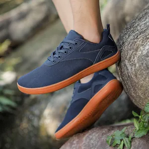 Men's navy blue wide knit barefoot sports shoes with durable caramel rubber soles