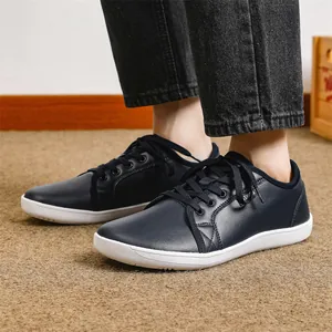 Scarpe casual uomo blu scuro a piedi nudi in pelle con suola bianca spessa e lacci