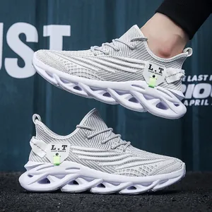Baskets de Mode pour Hommes Chaussures de Course en Maille Flyknit Respirante Semelle à Absorption des Chocs Évidée Chaussures de Marche Athlétiques