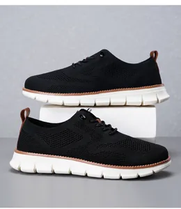Macro detail of breathable black knitted mesh and durable thick rubber soles on loafers