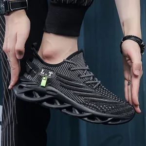 Baskets en maille tissée pour hommes avec texture noire et blanche et semelle creuse