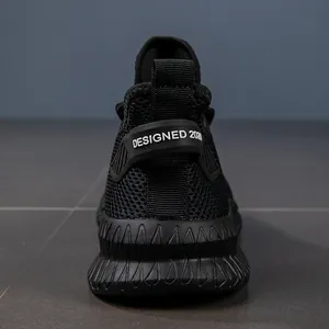Macro detail of breathable black mesh running shoe heel with thick rubberized gear sole