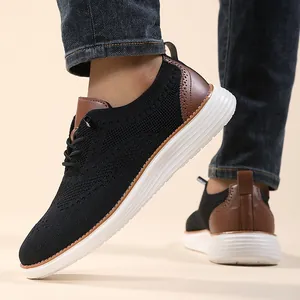 Men's breathable black flyknit loafers with brown leather trim and white foam sole