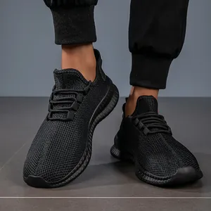 Detail view of breathable black mesh running shoes with thick anti-slip rubber soles