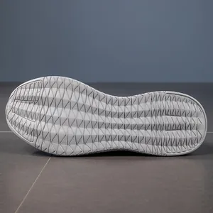 Detailed view of lightweight light grey wave-textured non-slip outsole for running shoes