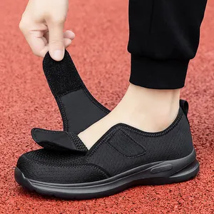 Lightweight breathable black mesh walking shoes with adjustable hook and loop straps for men