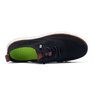 Close-up of black breathable knit upper with lace-up detail and white EVA sole