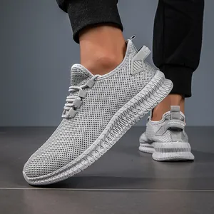 Detail of grey knitted mesh breathable sneakers with 2024 design heel pull tab