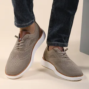 Macro shot of breathable khaki knit fabric and premium brown leather detail on the shoe
