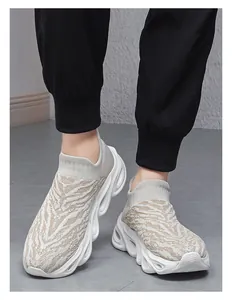 Detail view of knitted slip-on sneakers with animal print and hollow cushioning sole
