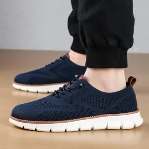 Detail of navy knit loafer with breathable mesh upper and textured white sole