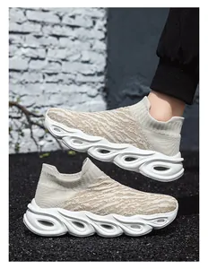 Detailed macro view of high-elastic knit texture and wave-shaped hollow thick sole