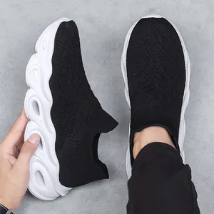Men's slip-on sneakers featuring breathable knit mesh and cushioned thick white soles