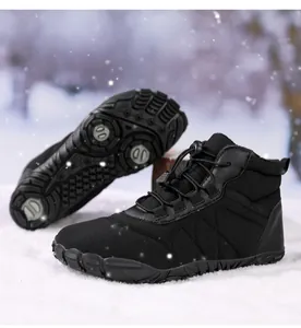 Detail of waterproof snow boots with quick-lace system and anti-slip rubber outsole