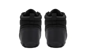 Rear view of black waterproof snow boots with quilted fabric and durable rubber sole
