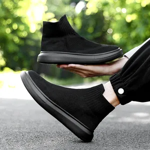 Black knitted high-top sock sneakers with thick rubber soles and breathable fly-knit fabric