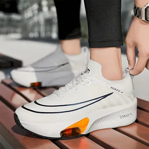 Scarpe da corsa bianche traspiranti con ammortizzatore arancione e strisce dinamiche