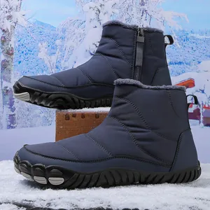 Detail of waterproof navy snow boot with side zipper and warm faux fur lining