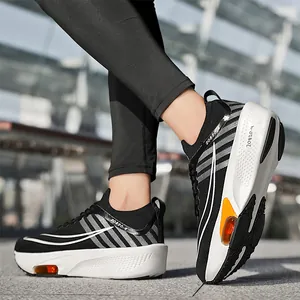 Scarpe da corsa leggere bianche e nere con ammortizzazione ad aria arancione