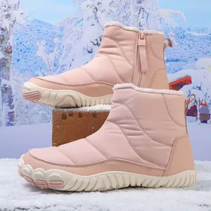 Pink winter snow boots for women featuring thick fleece lining and non-slip rubber soles