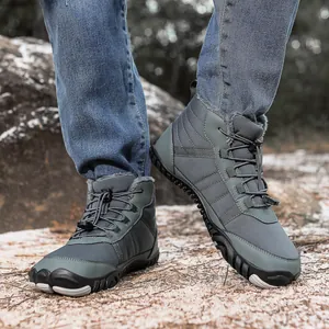 Detail of waterproof winter snow boots featuring warm faux fur lining and bungee laces