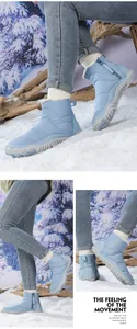 Detail view of light blue waterproof snow boot with side zipper and warm plush lining