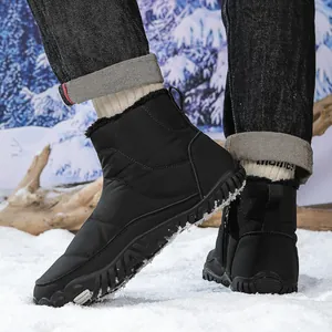 Outdoor snow scene of black waterproof boots with warm faux fur lining and side zipper