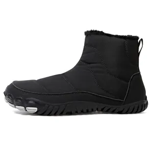 Detailed side view of black waterproof snow boots with quilted fabric and warm plush lining
