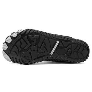 Detail view of durable rubber outsole with anti-slip geometric patterns for superior grip