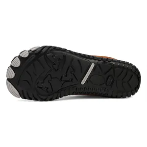 Macro shot of durable non-slip rubber outsole with geometric grip patterns for snow boots