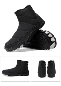 Close-up of waterproof snow boots with warm faux fur lining and anti-slip rubber sole