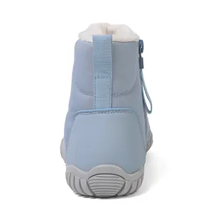 Rear view of light blue waterproof snow boot showing thick fur lining and anti-slip sole