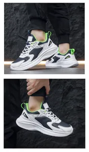 Details der Herren-Ledersneaker mit neongrünen Akzenten und dicker gedämpfter Sohle