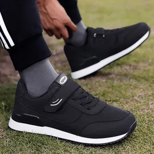 Comfortable black mesh walking shoes for seniors with non-slip soles and velcro straps