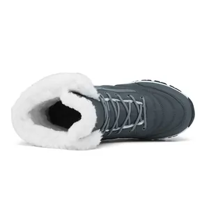 Detailed top view of winter snow boots featuring thick white plush lining and grey exterior