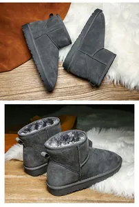 Vue détaillée des bottes de neige en daim gris avec doublure fourrure et semelle antidérapante
