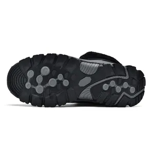 Detail of durable non-slip rubber outsole with deep grip patterns and warm fleece lining