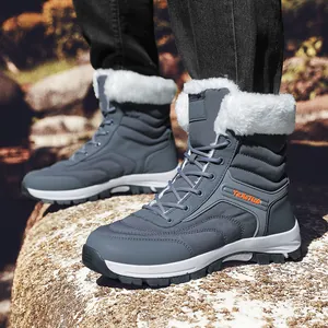 Waterproof winter snow boots with warm faux fur lining and non-slip thick soles in dark grey