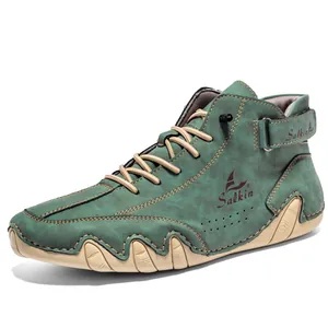 Dunkelgrüne Outdoor-Freizeitschuhe aus Leder mit Oktopus-Stich und Gummisohle