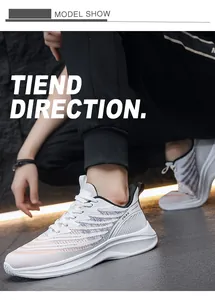 Side view of white breathable mesh running shoes with colorful wavy details and soft padding