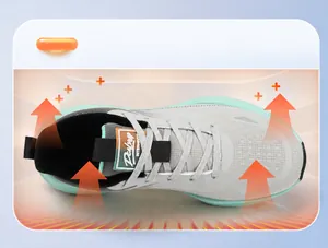 Detailed top view of grey winter sneakers with warm cashmere lining and mint green sole
