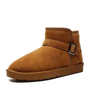 Classic chestnut leather snow boots with buckle strap and warm fur lining for winter wear