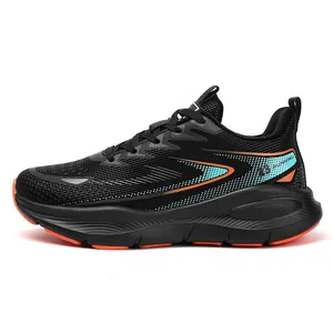 Detail of men's running shoe with black mesh, orange accents and cushioned white sole
