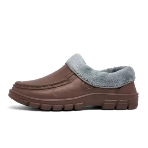 Detail of warm brown non-slip winter shoes with thick faux fur lining and stitching