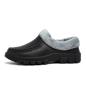 Close-up of winter slip-on shoe with warm grey faux fur lining and black leather texture