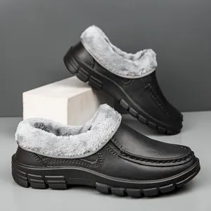 Detail view of winter black waterproof shoes with warm gray faux fur lining and anti-slip sole