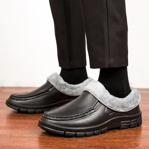 Detail of warm faux fur lining and anti-slip rubber sole on men's winter leather shoes