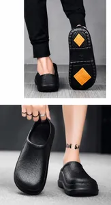 Detail of non-slip sole with yellow diamond grip pads on black waterproof chef shoes