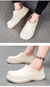 Detailed view of beige EVA work shoes featuring a thick anti-slip sole on indoor tiles